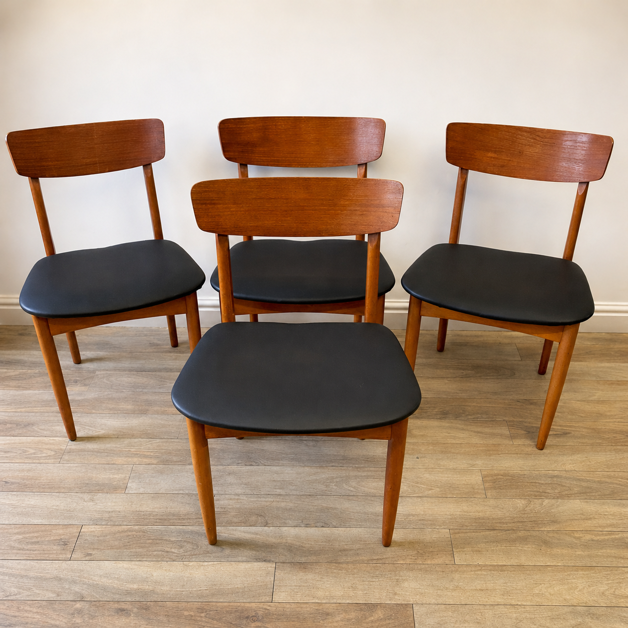 Set of Four Teak & Black Vinyl Dining Chairs